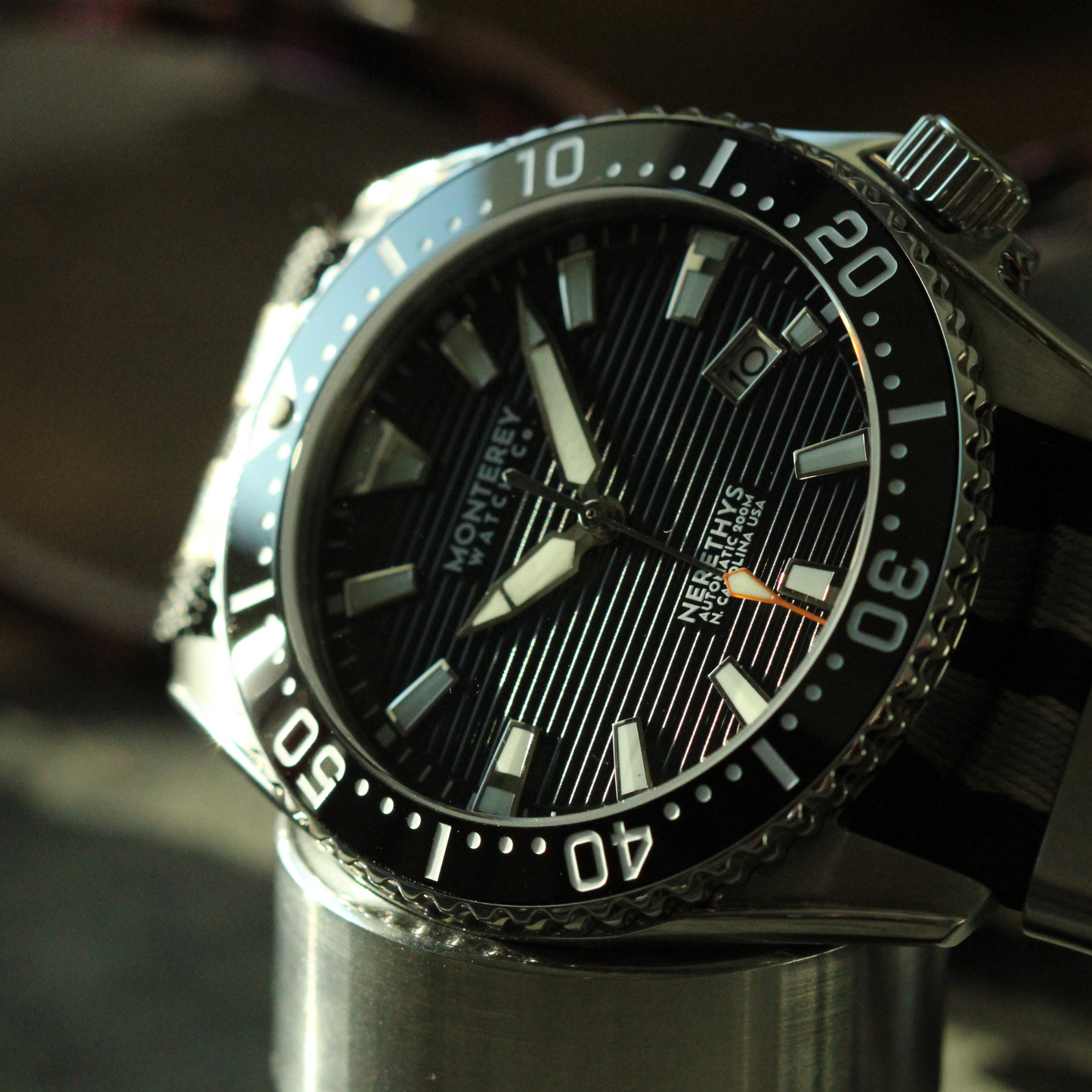 Monterey Watch Co Nerethys Pro Diver with black dial and steel bracelet.
